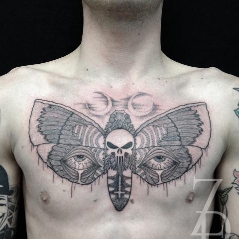 Colored mystical chest tattoo of butterfly with eyes