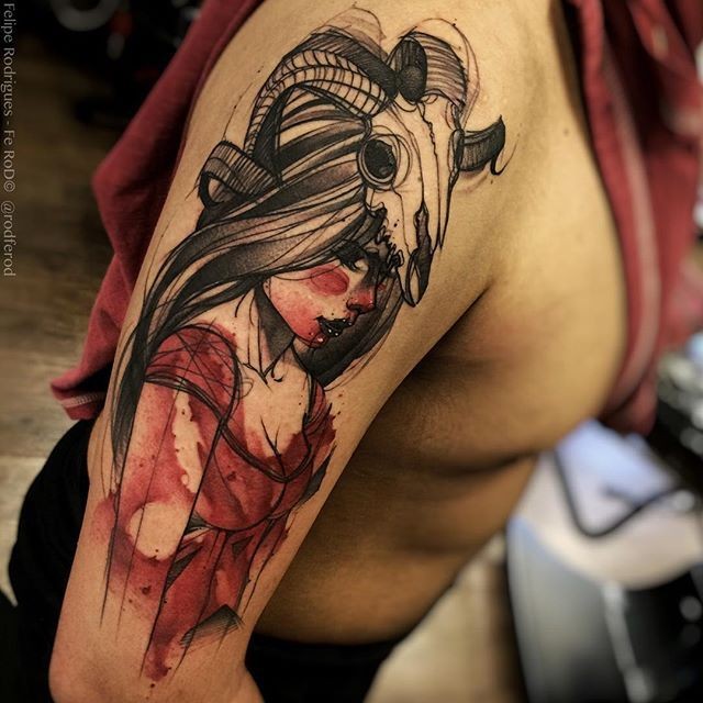 Colored sketch style shoulder tattoo of creepy woman with goat skull