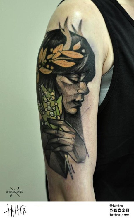 Colored sketch style shoulder tattoo of woman with leaves