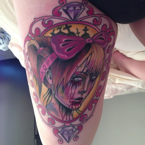 Colored spectacular looking thigh tattoo of bloody woman with lettering and diamond