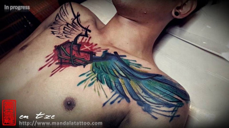 Colored whole chest tattoo of human hear with wings