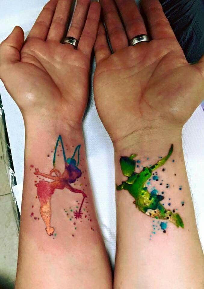 Colored wrist tattoo of watercolor Tinkerbell's