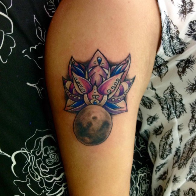 Colorful big lotus flower tattoo on shoulder combined with small moon