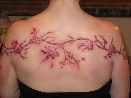 Colorful big vine tattoo on back