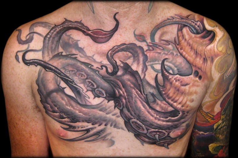 Colorful great giant squid tattoo on chest