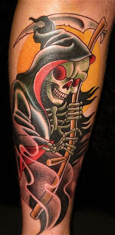 Colorful grim reaper tattoo on leg