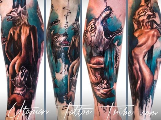 Colorful leg tattoo of sexy woman stripper with wolf