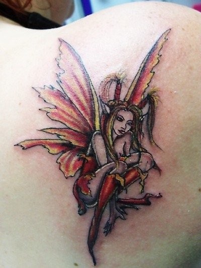 Colorful little fairy tattoo