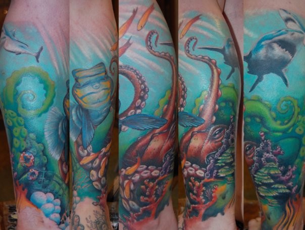 Colorful wonderful ocean tattoo on arm