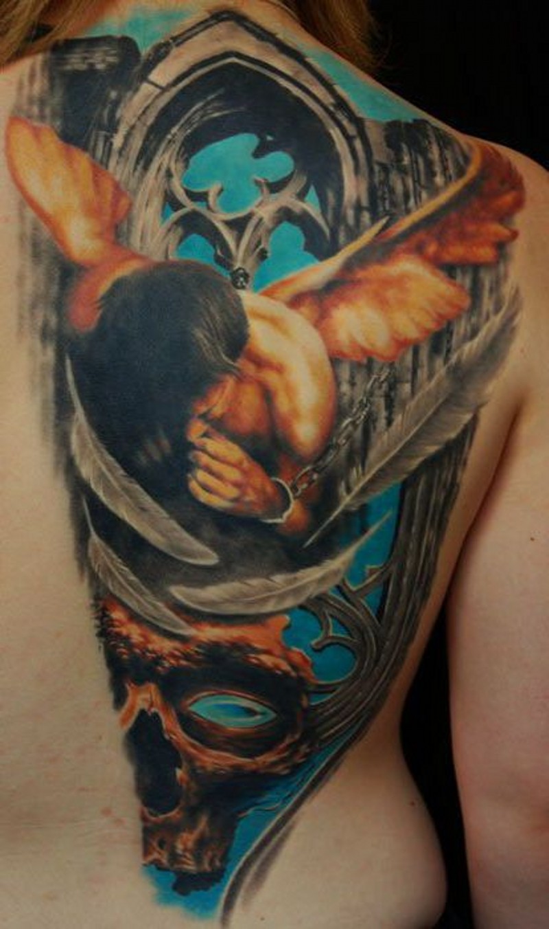 Coloured angel in chains and skull tattoo on back