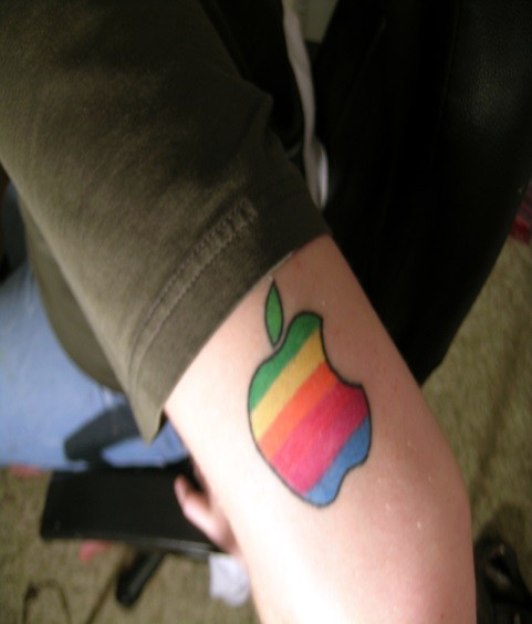 Coloured apple rainbow geek tattoo
