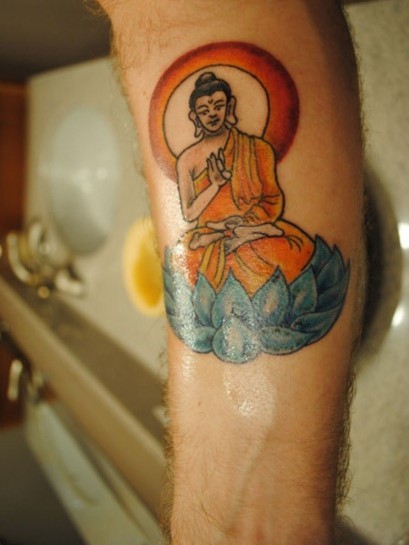 Coloured buddhist forearm tattoo