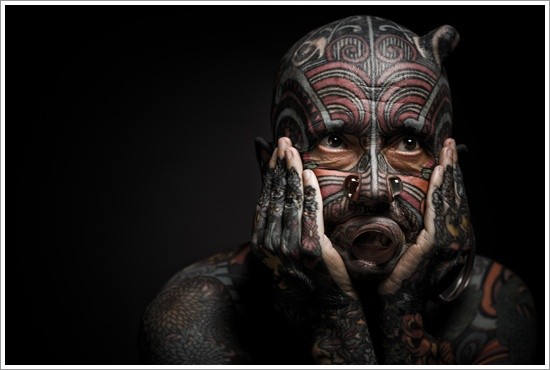 Coloured face tattoo for men