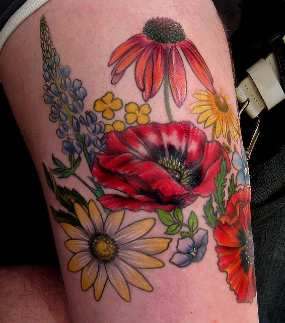 Coloured flowers tattoo for women