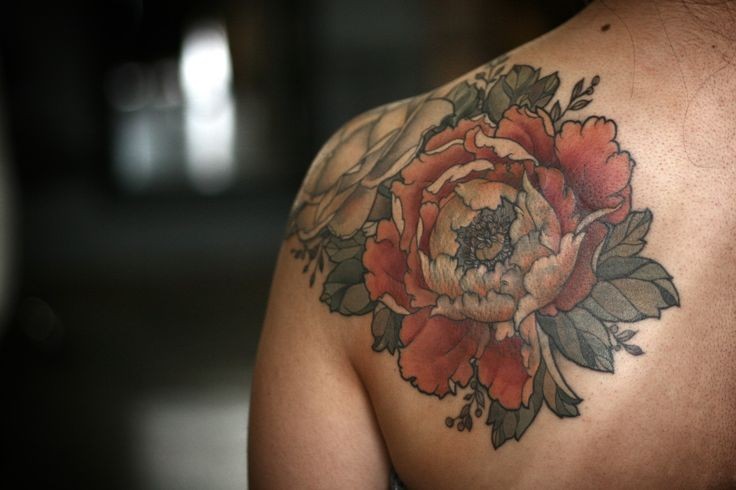 Coloured flowers tattoo on shoulder by Alice Kendall