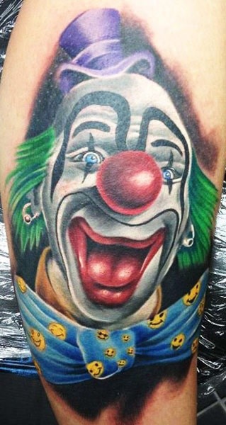 Coloured funny merry clown tattoo