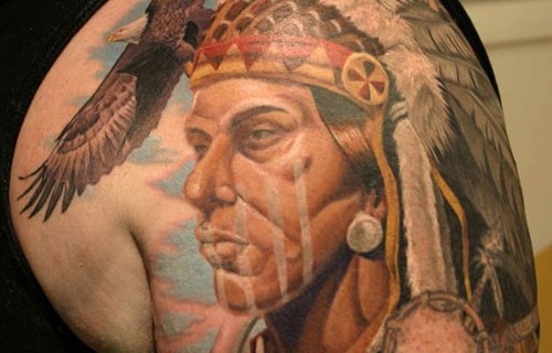Coloured native american chief with bald eagle tattoo
