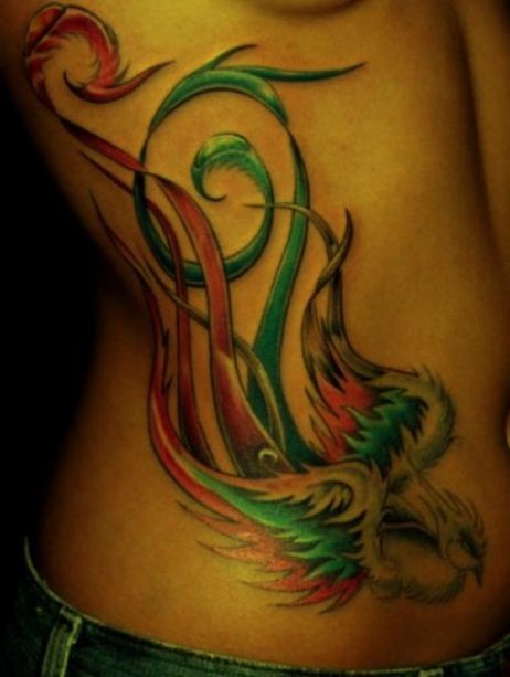 Coloured phoenix tattoo on ribs