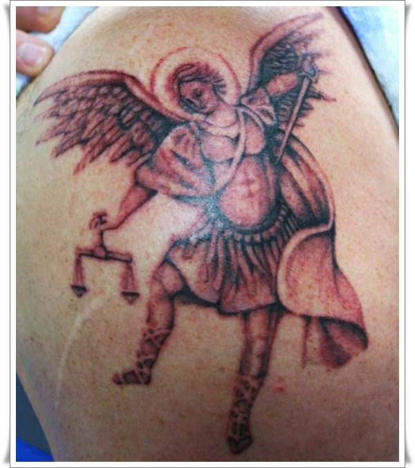 Coloured saint michael tattoo on shoulder