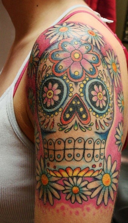 Coloured sugar skull tattoo on shoulder