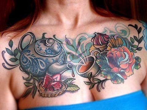 Coloured tea cup and cake tattoo on chest for girls