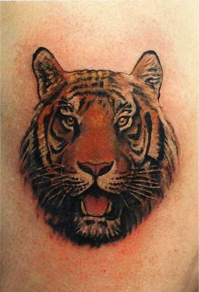 Coloured tiger head tattoo