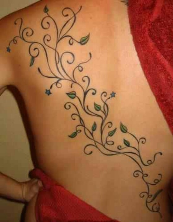 Coloured vine tattoo on back