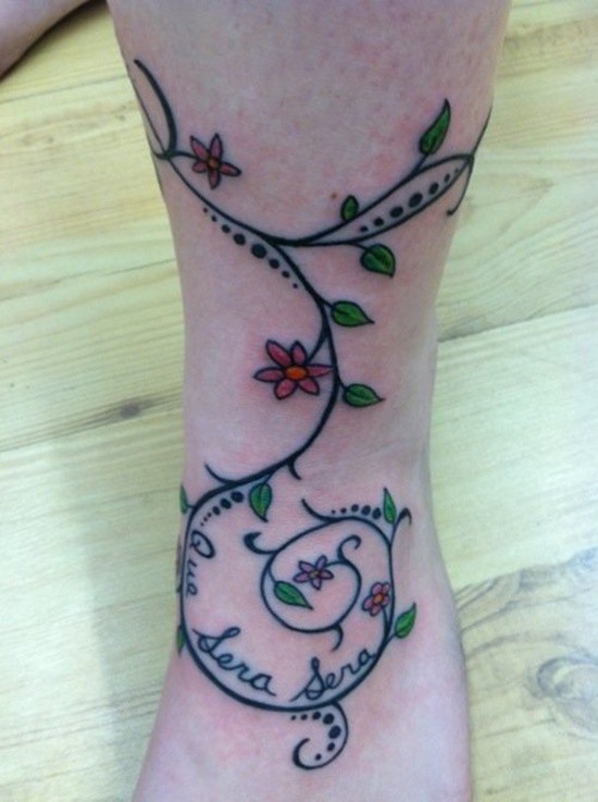 Coloured vine tattoo on leg