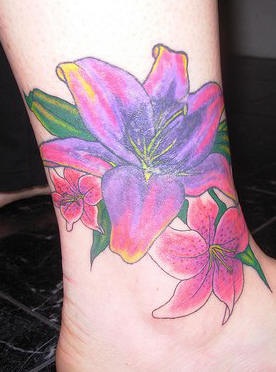 Colourful lily flowers tattoo