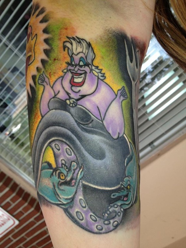 Comic books like colored arm tattoo of Ariel villain tattoo