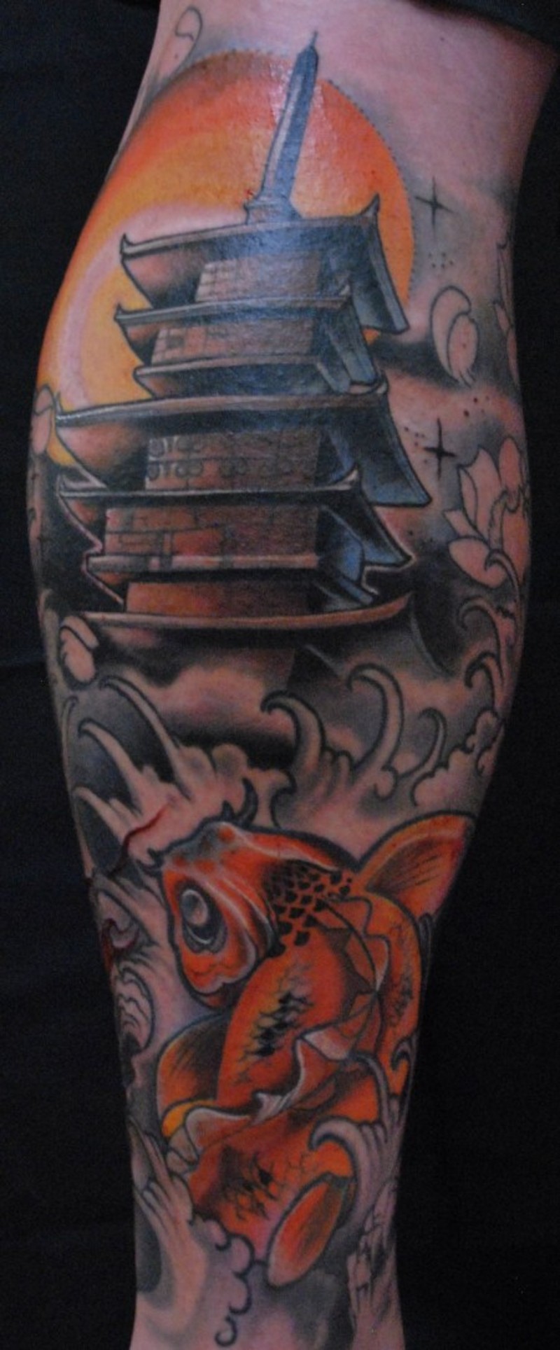 Comic books style colored big Asian house tattoo on leg muscle with golden fish