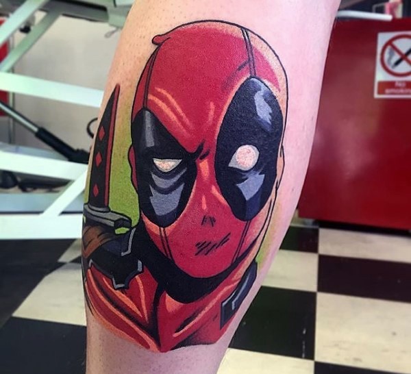 Comic books style colored leg tattoo of Deadpool