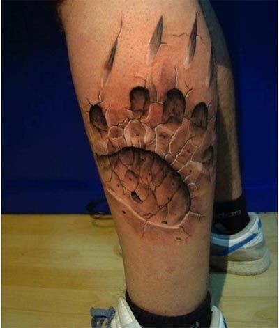 Cool 3d bear paw print tattoo on leg