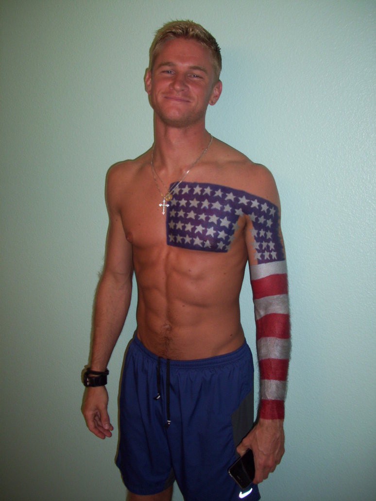 Cool american flag tattoo on chest and arm