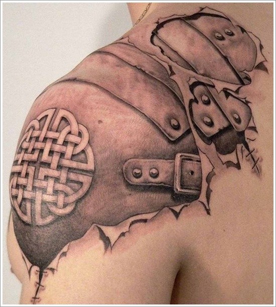 Cool armor with celtic pattern under skin rip tattoo