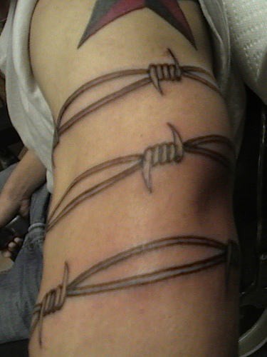 Cool barbed wire tattoo on arm
