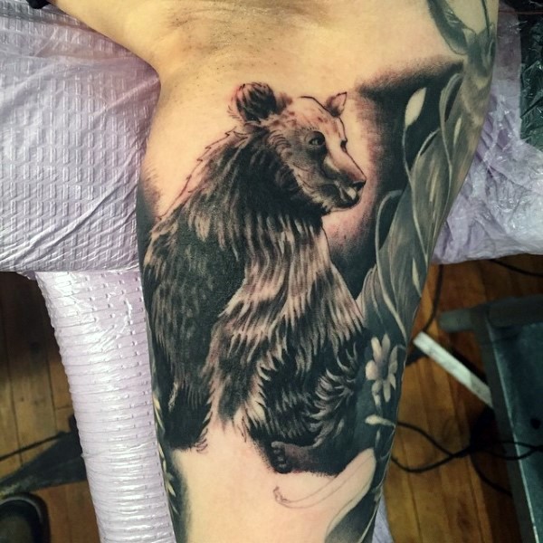 Cool black and white big bear tattoo on arm