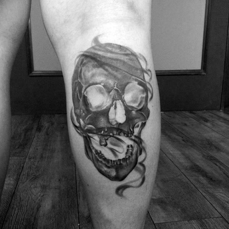 Cool black and white mysterious skull tattoo on leg