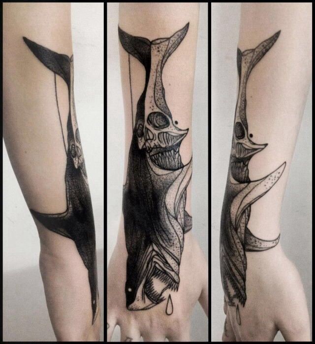 Cool blackwork style arm tattoo of shark by Michele Zingales