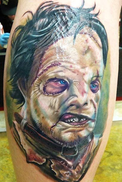 Cool colored very realistic monster portrait tattoo on leg