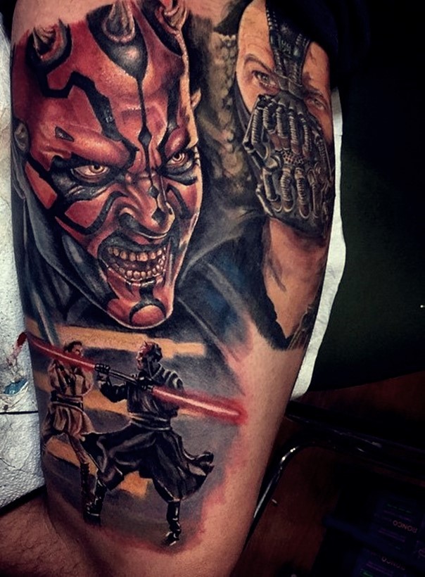 Cool designed very detailed natural colored various movie evil heroes tattoo on biceps