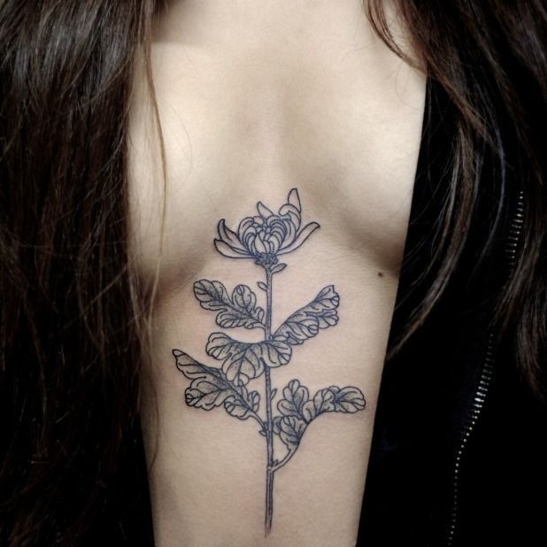 Cool idea of flowers tattoo for girls