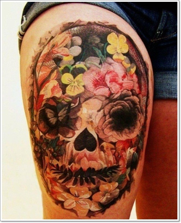 Tatuaje de calavera mexicana en la pierna