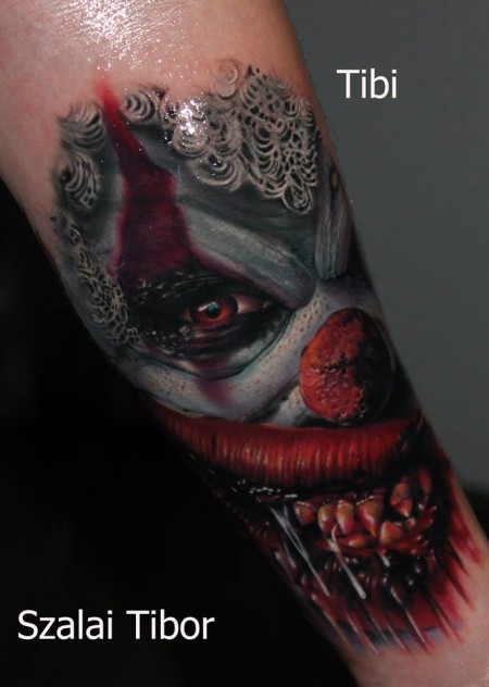 Cool idea of spooky clown tattoo on arm by Szalai Tibor