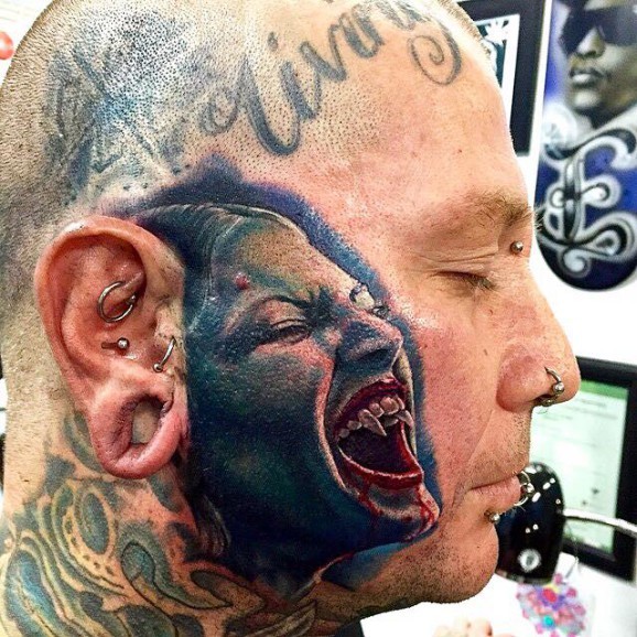 Cool idea of vampire tattoo on head by Neil Braithwaite