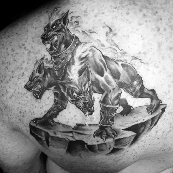 Cool illustrative style scapular tattoo of evil Cerberus