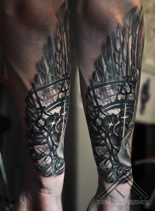 Cool looking black and white clock tattoo on forearm