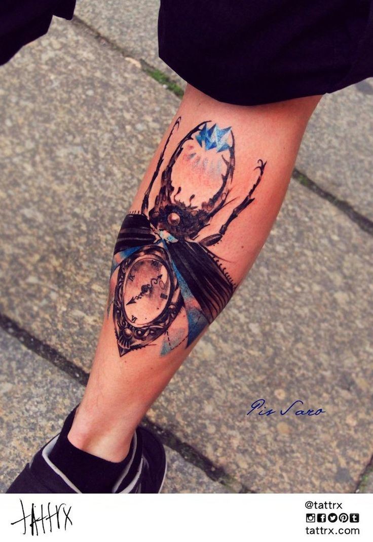 Cool looking colored leg tattoo of big clock made from big bug