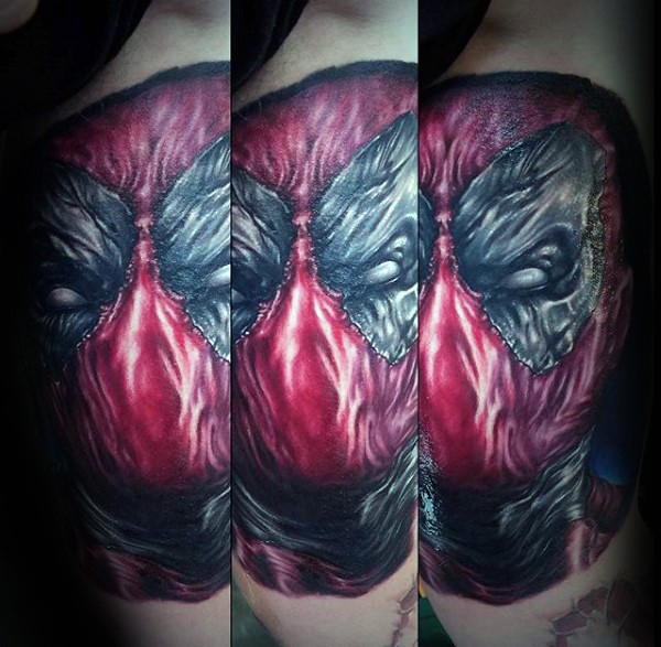 Cool looking colored very detailed tattoo of Deadpool hero face