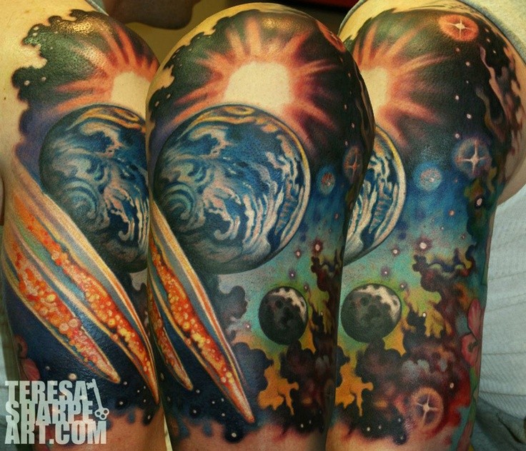Cool looking massive space colored tattoo on upper arm